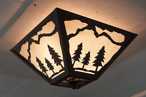CL805-15 - Semi-flush mount model - Design 521 - With mountains only top border design - Pinecone Medallion - Pinecone Finial - Shown illuminated