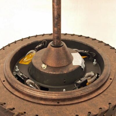 Top view of fan up lighting feature - provides ambient light on the ceiling above the fan with 3-15W candelabra bulbs (included) and illuminates the interior designs