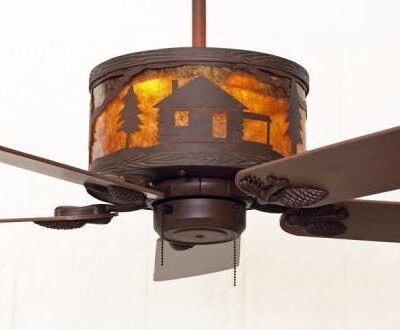 Mountainaire Rustic Ceiling Fan Cabin Scene in Color C146 with Amber Mica Liner (illuminated)